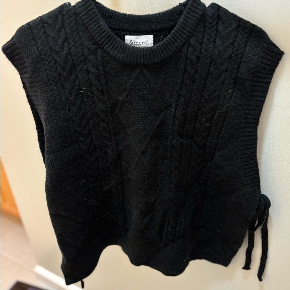 Black sweater vest, with adjustable side ties